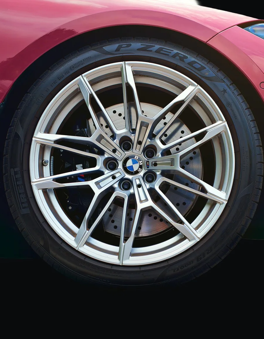 Extreme close-up of a vehicle's alloy wheel